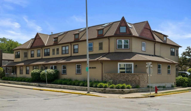 100 MAIN ST APT 104, PEWAUKEE, WI 53072 - Image 1